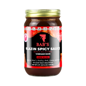 Blazin Spicy Sauce in glass jar with bold flavors and vinegar base.