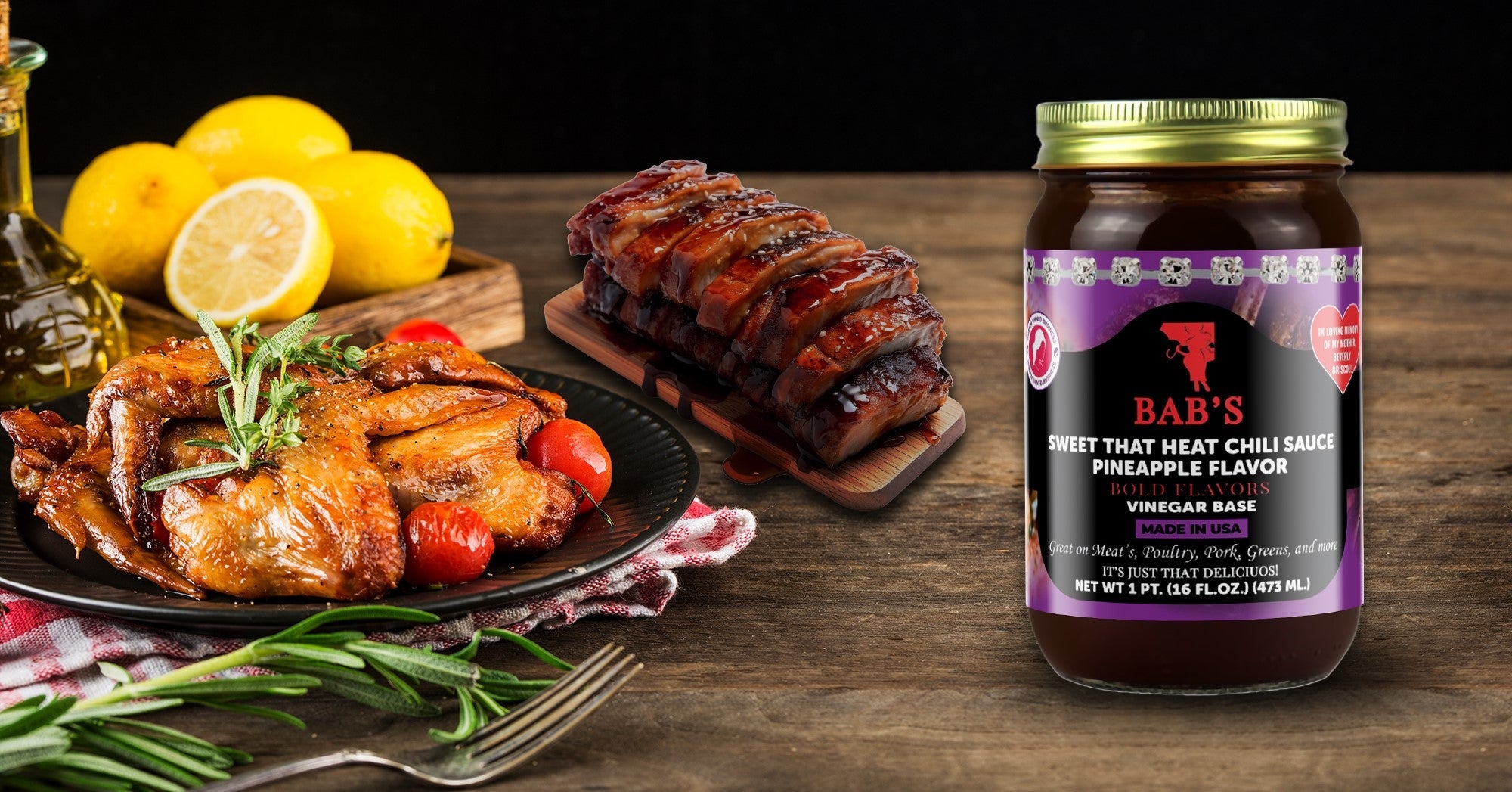 Sweet That Heat Chili Sauce Pineapple Flavor next to roasted meats and fresh lemons.